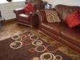 brown leather sofa and chair